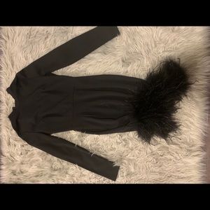 Black dress trimmed with fur @ bottom